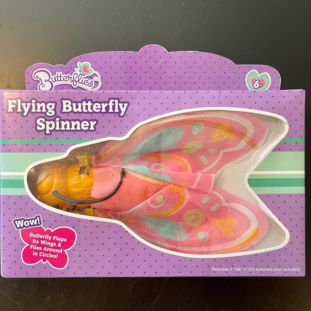 Colorful Learning Toy Flying Butterfly Spinner in Pink and Yellow